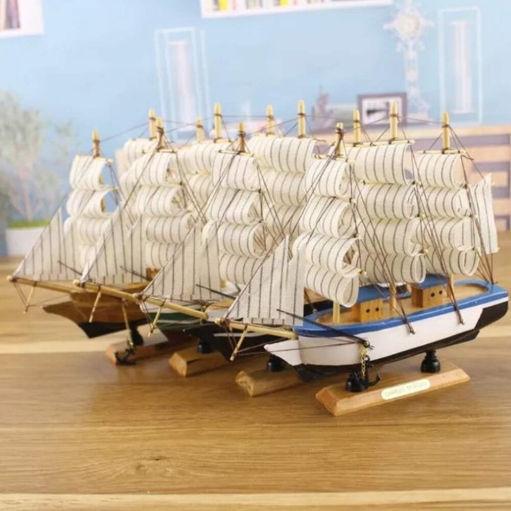 Handcrafted wooden sailing ship showpiece